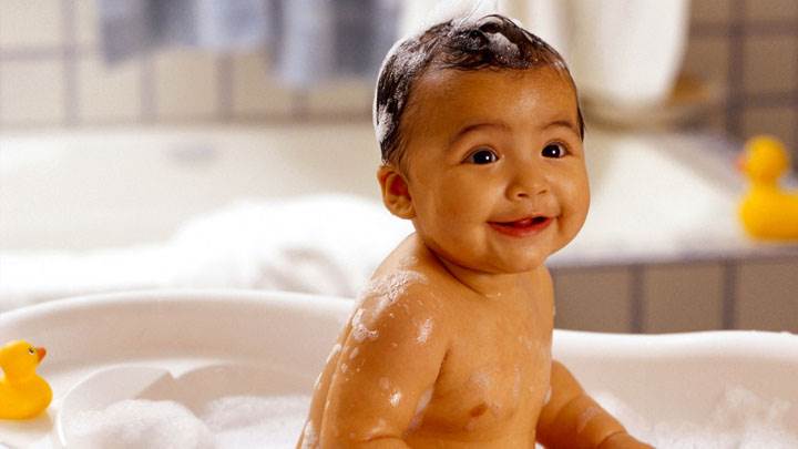 Cute Baby Smiling in Bath Tub